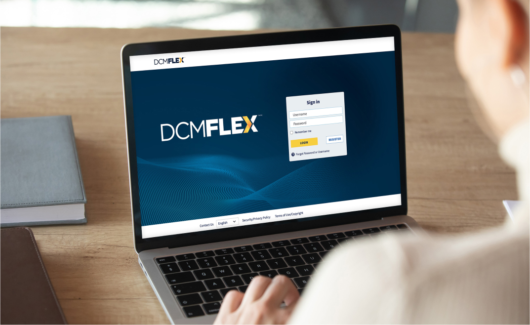 A focused shot of a laptop with DCMFlex login screen.