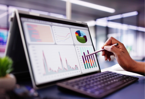 laptop showing data and analysis