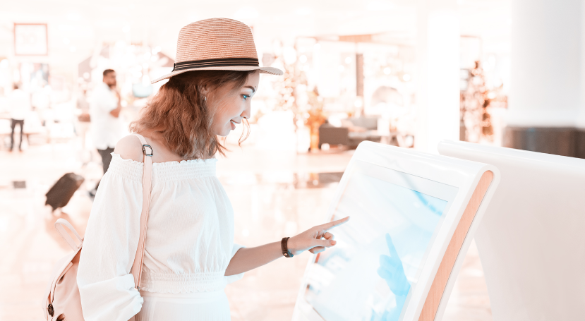 girl using a kiosk